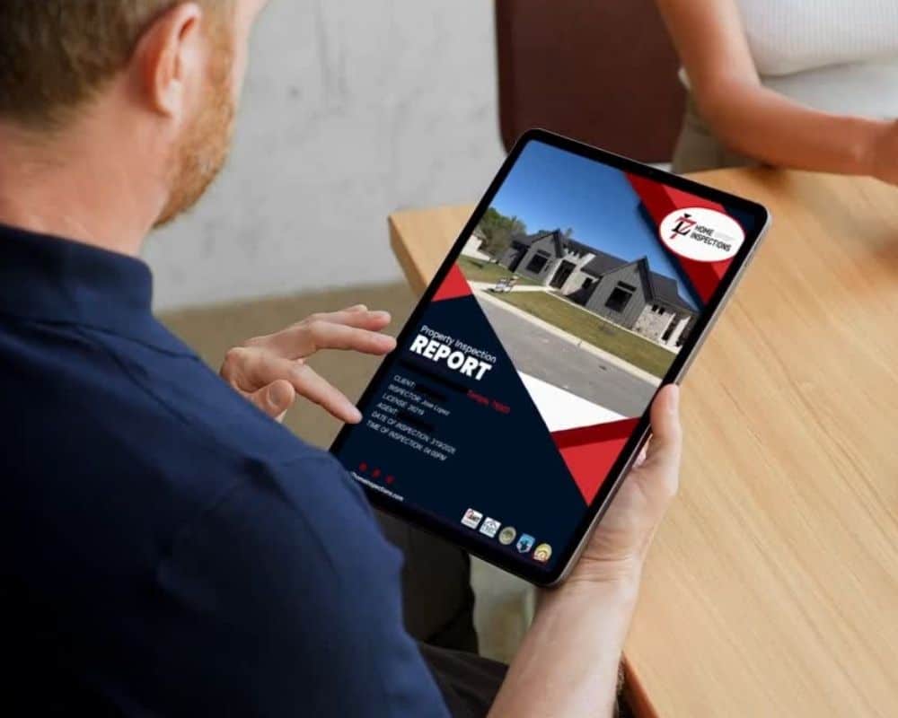 Person holding tablet with report